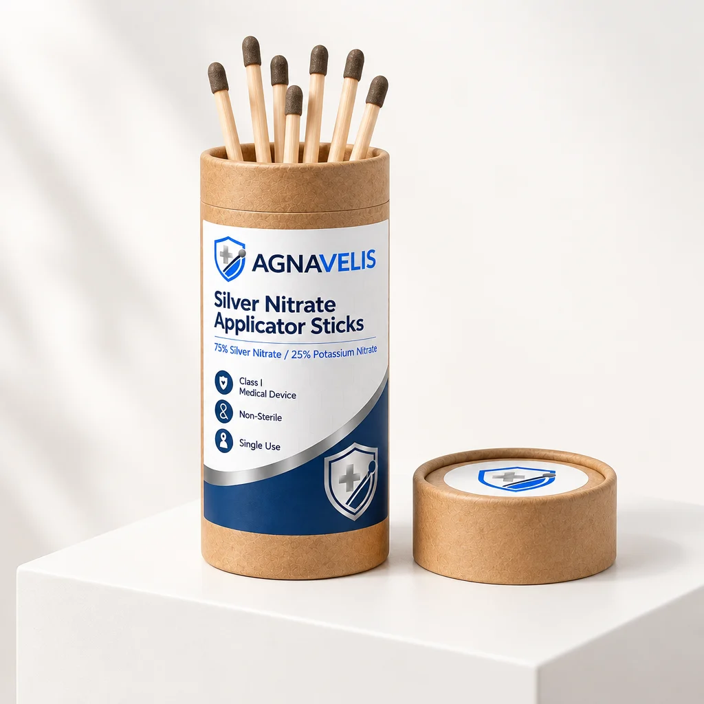 Opened AGNAVELIS kraft packaging tube with wooden silver nitrate applicator sticks and the detached lid beside it